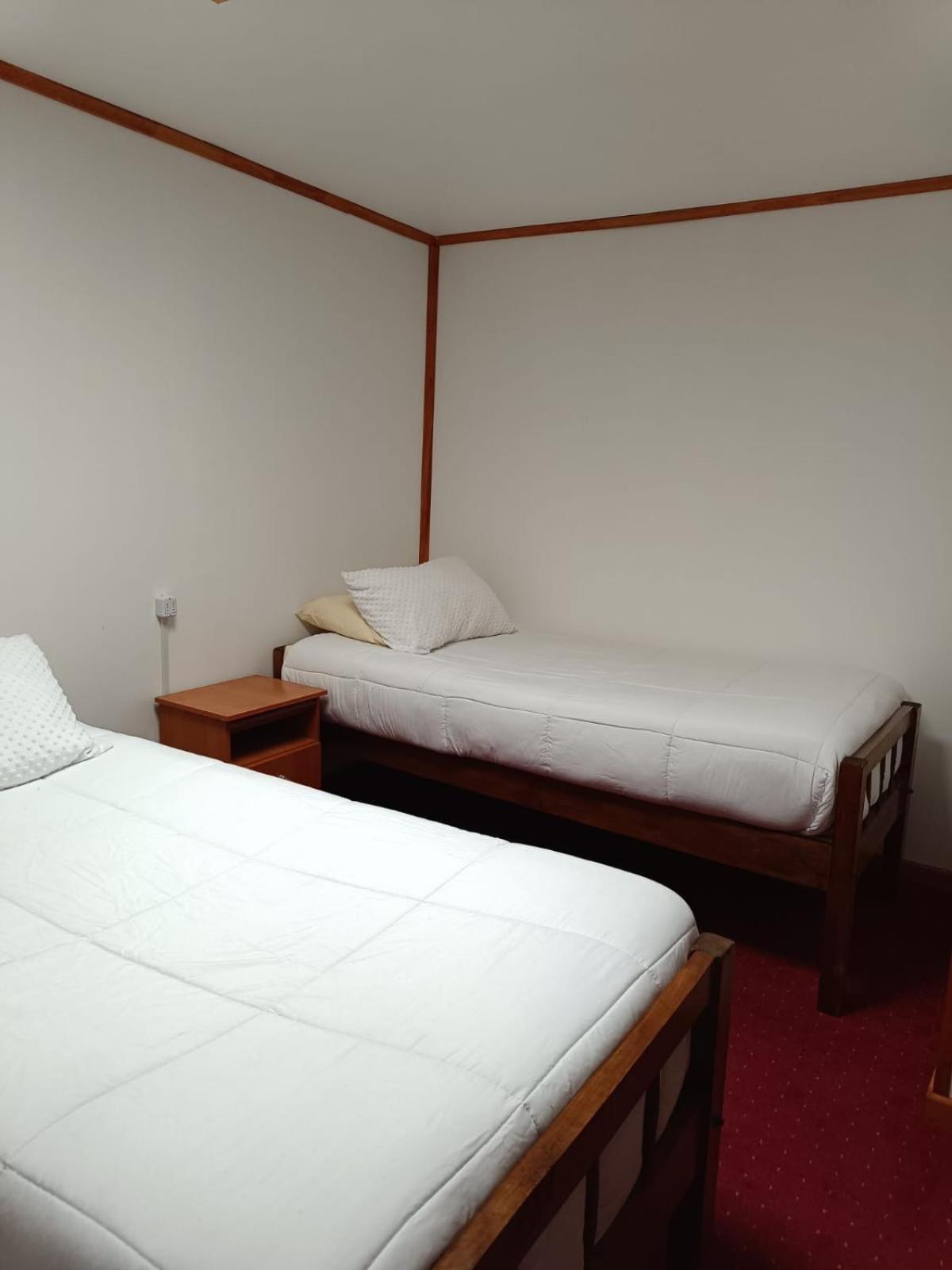 Hostal B&B Coastal Natales Пуерто Наталес Екстериор снимка
