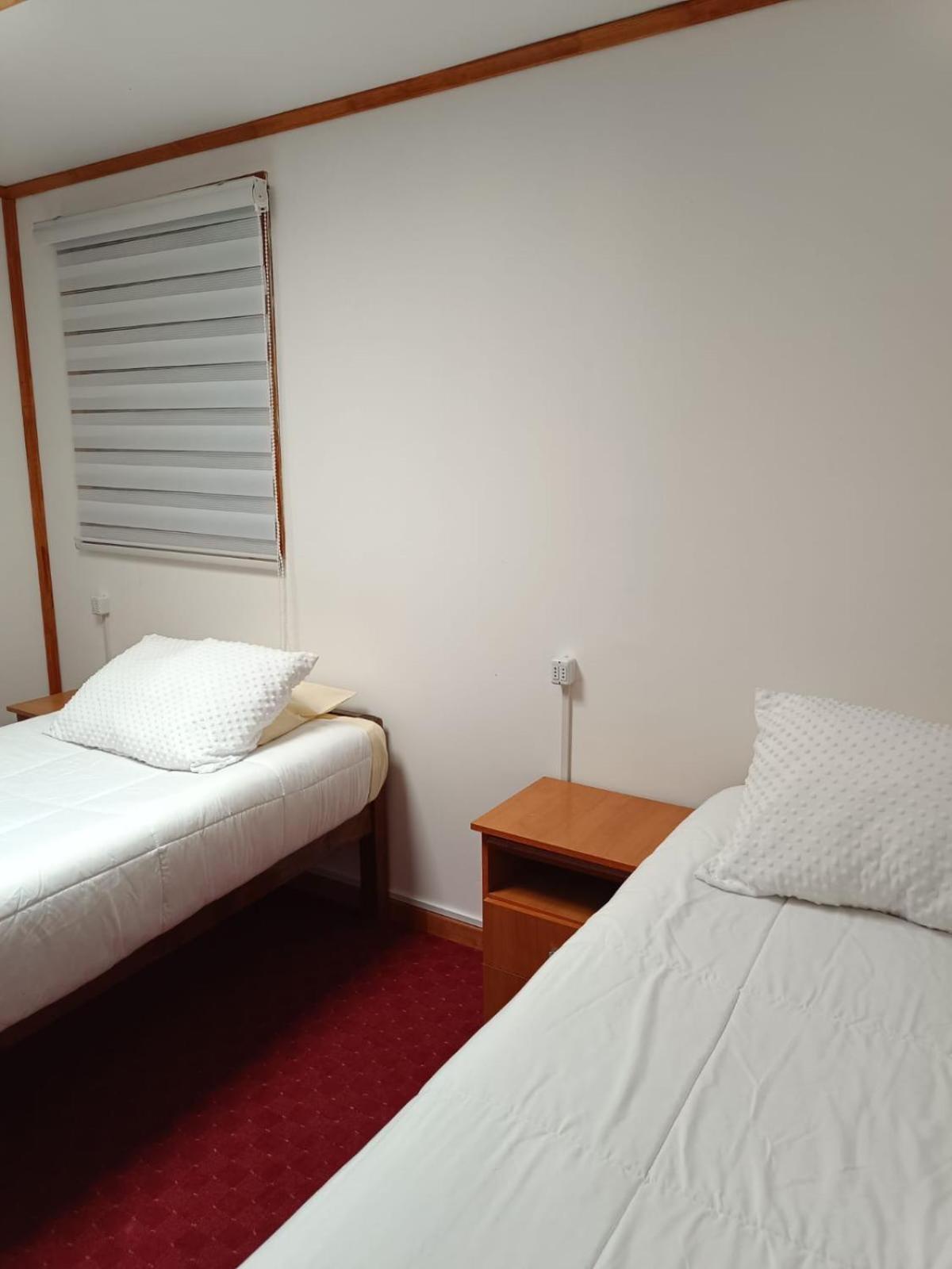 Hostal B&B Coastal Natales Пуерто Наталес Екстериор снимка