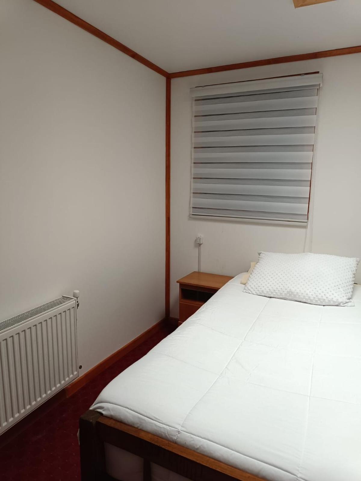 Hostal B&B Coastal Natales Пуерто Наталес Екстериор снимка